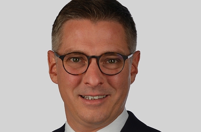 ROMAN B. SCHLAGER