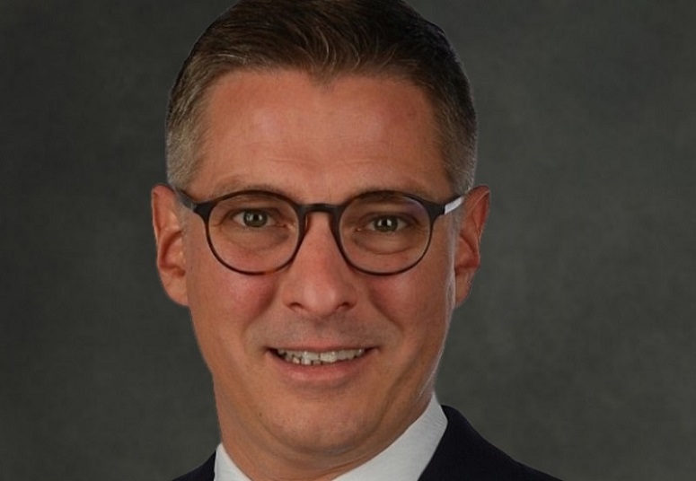 ROMAN B. SCHLAGER